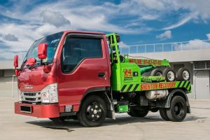 How do I track the status of my tow truck?